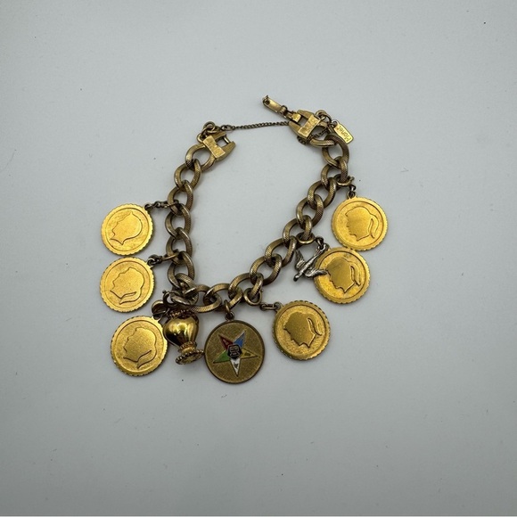 Vintage Monet Gold Tone Charm Bracelet with 9 Charms Easter Star Safety Chain - Picture 8 of 8